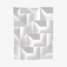 an abstract white background with squares and rectangles in the shape of cubes