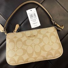 Nwt Coach Nolita 19 In Blocked Signature Canvas Bag Purse Ca444 Product Details Signature Coated Canvas And Refined Pebble Leather Two Credit Card Slots Inside Multifunction Pocket Zip-Top Closure, Fabric Lining Handle With 6 1/4" Drop 7 1/2" (L) X 4 1/2" (H) X 2" (W) Style No. Ca444 Coach Nolita 19, Coach Nolita, Nolita 19, Large Crossbody Purse, Coach Bucket Bag, Fanny Bag, Gold Bag, Frame Bag