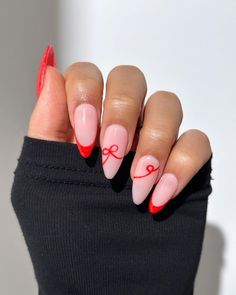 30+ Bow Nail Designs That Reflect the Essence of Coquette Elegance 2024 Holiday Nail Trends, Pink With Red French Tip, Nails Design With Hearts, Christmas Simple Nails Winter, Nail Idea Christmas, Old Money Holiday Nails, Nails Bows Design, Christmas Nails 2024 Almond, Pink And Red Bow Nails