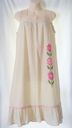 This is an Authentic Turkish hand sewed loose flowy women summer dress made with 100% cotton. Made from a special handmade garment in Turkey for over 150 years called "Sile Bezi".  + It's a short shoulder strap beige dress with big pink Turkish flower motifs.  + For best fit please see below for fit measurements + Please note that the dress comes with special washing instructions. It's perfect for hot summer days. It's very light and airy. Can be dressed at the beach or casually during days or at nights.  One of a kind design makes this dress unique. Each size may have different colors and motifs. Therefore each dress is completely uniquely made almost once.  Measurements: ------------------------------------------- Dress Length: 39" (from shoulder to bottom) Neck Gap: 7" Arm Gap (Diagonal Beige Cotton Summer Sundress, Summer Beige Cotton Sundress, Beige Cotton Sundress For Summer, Summer Embroidered Cotton Sundress, Embroidered Cotton Sundress For Summer, Beige Cotton Sundress, Summer Cotton Sundress With Floral Embroidery, Bohemian Cotton Sundress For Daywear, Folk Style Summer Dresses For Daywear