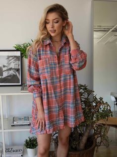 -Oversized pleated long sleeve flannel dress with button front -2 oversized pockets on chest and 2 small pockets on the bottom -Flare at the bottom -Can be worn with a belt for a more shaped look. -Color: Coral -32 inches long from shoulder to bottom -80% Cotton 20% Polyester -Size Chart Flannel Over Dress Maternity, Long Sleeve Plaid Cotton Dress For Fall, Long Sleeve Cotton Plaid Dress For Fall, Casual Long Sleeve Plaid Dress For Fall, Plaid Long Sleeve Dress With Pockets, Plaid Long-sleeve Dresses With Pockets, Long Sleeve Plaid Dress With Pockets, Fall Plaid Shirt Dress With Buttons, Plaid Shirt Dress With Buttons For Fall