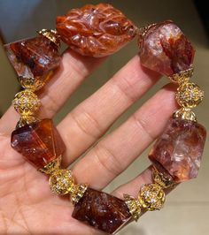 Material: Natural Red Hematoid Lepidocrocite Quartz beads  size : 18-20mm   quantity: one strand 6mm approx 29 pcs one strands 7mm approx25 pcs one strands 8mm approx 22 pcs one strands 9mm approx 21pcs one strands 10mm approx 19 pcs one strands 11mm approx 18pcs one strands 12mm approx 16 pcs one strands 13mm approx 16 pcs one strands 14mm approx 15 pcs one strands 15mm approx 14pcs one strands 16mm approx 14 pcs one strands 17mm approx 13pcs one strands 18mm approx 13pcs one strands 19mm appro Amber Agate Gemstone Bracelets, Unique Red Gemstone Bracelets, Unique Red Gemstone Bracelet, Luxury Red Gemstone Bracelet, Red Gemstone Spiritual Beads, Red Gemstone Bracelet, Luxury Unique Red Beads, Luxury Red Gemstone Beads, Red Garnet Crystal Bracelet