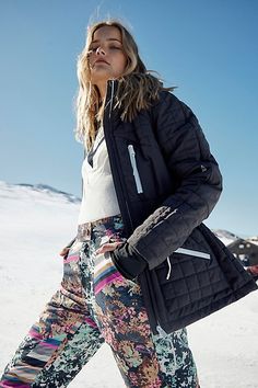 Made for the slopes, this ski-ready jacket features a fully waterproof design that keeps moisture out with a Primaloft insulated design to keep you warm while staying lightweight and locking out the cold. With a fitted silhouette and adjustable hooded neckline, you’ll stay extra cozy in cold temps, plus it’s equipped for everything you need for a ski trip from a detachable hood, lots of pockets, underarm and ski vents for air flow, and knit cuffs and thumbholes. **The Fit:** Fitted design to kee Casual Black Skiing Outerwear, Sporty Ski Outerwear With Adjustable Hood, Rei Ski Jacket, Fitted Black Skiing Outerwear, Women’s Ski Jacket, Black Ski Jacket, Quilted Outerwear, Free People Black, Cross Country Skiing