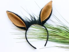 an animal ears headband made out of grass