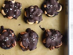 chocolate covered cookies on a baking sheet ready to be eaten