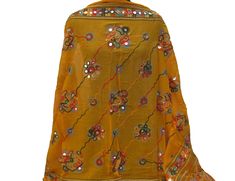 Pattern - embroidered sequin scarf. Ideal for - women/ girls. Occasion - formal or casual. Fabric - cotton. It has an embroidered floral pattern all over. This piece is from the Kutchh area of Gujarat. It is hand-painted and embroidered. Color - On a yellow background, embroidery is done with different colored threads and mirror sequins. Plastic sequins are used because they are lightweight. Size - 40 x 84 inches(approx). Care - gentle hand wash. For more such scarves please visit- https://www.e Traditional Dupatta With Mirror Work For Spring, Spring Bollywood Dupatta With Mirror Work, Summer Festive Dupatta With Motifs, Traditional Spring Scarves As Gifts, Traditional Spring Scarves For Gifts, Traditional Embroidered Shawl For Summer, Festival Scarves With Motifs, Traditional Spring Scarves For Gift, Traditional Cotton Shawl For Spring