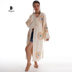 Introducing our Boho Cotton Kimono Robe, a must-have Morning Robe made of sustainable fabric for the eco-conscious and style-savvy individual. This luxurious robe is perfect for lounging in style or adding a bohemian touch to your everyday outfit. Handcrafted with care and attention to detail, this kimono robe is fashionable and eco-friendly. Embrace comfort and sustainability with our exquisite Boho Cotton Kimono Robe. ⭐ CODE: 400504016 ⭐ Fabric: 100% Cotton ⭐ Size: One Size ⭐ Category: Kimono, Long-sleeved Cream Summer Robe, Long Sleeve Cream Robe For Summer, Cream Long Sleeve Summer Robe, Cream Long Sleeve Kimono For Summer, Cream Long Sleeve Summer Kimono, Summer Cream Long Sleeve Kimono, Cream Summer Kimono For The Beach, Cream Summer Beach Kimono, White Long Sleeve Kimono For Beach Season