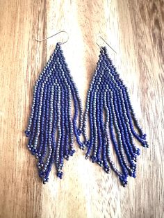 Handwoven seed bead earrings with sterling silver earwires. 3 1/2" long Blue Handwoven Beads For Jewelry Making, Handwoven Blue Jewelry With Round Beads, Blue Handwoven Round Bead Jewelry, Blue Handwoven Round Beads Jewelry, Blue Beaded Earrings With Dangling Round Beads, Blue Handwoven Dangle Jewelry, Adjustable Blue Beaded Fringe Earrings, Blue Long Drop Jewelry With Beaded Fringe, Blue Beaded Fringe Dangle Earrings