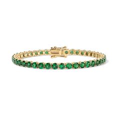 Enhance your jewelry collection with the captivating beauty of our Green Tsavorite Tennis Bracelet. Adorned with vivid green gemstones, this exquisite piece radiates elegance and charm. Available in 14K Yellow Gold and White Gold Carat weights are reflective of a 7in bracelet. Shorter lengths will have lower carat weights that those listed. Gemstones are natural, therefore colors may vary Luxury Green Tennis Bracelet For Wedding, Luxury Green Tennis Bracelet As Gift, Timeless Tsavorite Green Jewelry, Elegant Green Oval Diamond Bracelet, Formal Green Diamond Bracelet With Gemstone, Formal Green Emerald Bracelets, Green Gemstone Diamond Bracelet For Formal Occasions, Green Emerald Bracelets For Formal Occasions, Green Emerald Bracelets For Formal Events