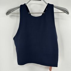 Quince Women's Ultra-Soft Performance Cropped Tank - New With Tags Color: Navy Blue Size: Xs 84% Recycled Polyester, 16% Spandex Quick-Dry Moisture-Wicking Anti-Microbial 4-Way Stretch Measurements 13" Pit-To-Pit, Laying Flat 12.5" Length 13" Waist, Laying Flat Navy Sleeveless Casual Activewear, Navy Casual Sleeveless Activewear, Blue Crew Neck Crop Top For Sports, Casual Navy Sleeveless Activewear, Casual Cropped Sports Tops, Blue High Stretch Casual Crop Top, Blue High Stretch Sports Bra, Casual High Stretch Blue Crop Top, Seamless Sports Crop Top With Crew Neck