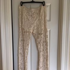 Crochet pants Brand new never wore! Impulse buy! Can be used as swim cover pants or worn as pants! Has lining for shorts inside Rue21 Pants Crochet Pants, Swim Cover, Rue 21, Rue21, Pants Color, Pant Jumpsuit, Pants For Women, Brand New, Cream