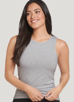 For yoga, summer days, or just hanging around the house, the Jockey® High Neck Rib Knit Tank is the tank you'll always reach for. Silky-soft fabric with a bit of stretch offers a flattering fit that feels great, right down to the tag-free neckline. With a length that's just right, pair this easy tank with everything from leggings to jeans for a casual look that just works. | Jockey® High Neck Rib Knit Tank in Light Grey Heather Gray Sleeveless Activewear For Loungewear, Gray Yoga Top For Summer, Gray Yoga Tops For Summer, Gray Summer Yoga Top, Summer Sleeveless Ribbed Activewear, Gray Summer Tops For Yoga, Gray Seamless Casual Tank Top, Gray Casual Seamless Tank Top, Casual Sleeveless Activewear For Relaxation