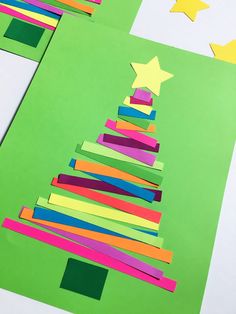 this is an easy christmas tree craft for kids to make with construction paper and colored strips