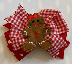 "ADORABLE GINGHAM GINGERBREAD GIRL BOW! **The size of the pictured bow is 5 inches, but can be ordered in other sizes with the same shipping time. Hair bows may be made with a french barrette, an alligator clip (as shown), or a hair tie. ITEM DETAILS: *Ribbon Type: Base Layer- red with white dots Top Layer-red and white gingham Embellished with a pretty embroidered gingerbread girl *BOW DIMENSIONS: 4.5, 5\", or 6\" *CLASP: French Barrette or Alligator Clip *Edges are heat sealed to prevent frayi Gingerbread Girl, Bow Christmas, Christmas Bow, Packaging Gift, French Barrette, Pretty Packaging, Red Gingham, Diy Hair Bows, Red Polka Dot