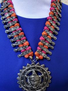 Stunning statement necklace - colorful thread necklace with large Hindu Kali Durga Goddess pendant. Dramatic! Durga is a warrior goddess, and she is depicted to express her martial skills. She is also a fierce form of the protective mother goddess. In oxdiized silver. Necklace is 1.5 inches wide. Thick piece, cast in metal to give a great 3D effect. Adjustable cotton thread necklace via sliding bead, from 8.5 in to 16 in, so as to ensure a perfect fit for you. Large, heavy cast metal pendant mea Handmade Pendant Necklace For Navratri, Handmade Spiritual Necklace For Navratri, Bohemian Multicolor Temple Necklace As Gift, Multicolor Amulet Necklace For Festivals, Multicolor Amulet Necklaces For Festivals, Multicolor Amulet Necklaces For Festive Occasion, Multicolor Amulet Necklace For Festive Occasions, Handmade Multicolor Necklaces For Rituals, Handmade Multicolor Bohemian Temple Necklace