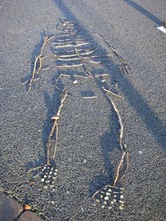 the skeleton is drawn on the road in the street