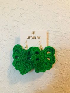 Cute crochet leaf earrings. The perfect gift for any plant lover! Handmade Leaf-shaped Earrings, Hand Knitted Jewelry As A Gift, Green Crochet Jewelry, Trendy Handmade Leaf-shaped Earrings, Handmade Green Leaf-shaped Earrings, Green Macrame Earrings As A Gift, Green Macrame Earrings For Gift, Casual Green Macrame Jewelry, Crochet Leaf Earrings