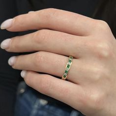 Clean And Simple, This Fabulous Channel Set Band Ring Is Encrusted With 5 Round Cut Emeralds And 4 Round Brilliant Cut Diamonds. Total Diamond Weight: 0.20 Carat. Total Emerald Weight: 0.25 Carat. Crafted In 14k Yellow Gold. Ring Size 6.25. Width: 3.2 Mm. Weight: 2.33 Grams. Excellent Preowned Condition. Comes With A Presentable Gift Box. Id: 02449 Formal Half Eternity Emerald Ring, Classic Green Eternity Promise Ring, Fine Jewelry With Channel Set Green Stones, Fine Jewelry Green Channel Set, Fine Green Jewelry With Channel Set, Classic Green Half Eternity Band, Green Channel Set Fine Jewelry, Formal Green Half Eternity Jewelry, Classic Gemstone Eternity Band