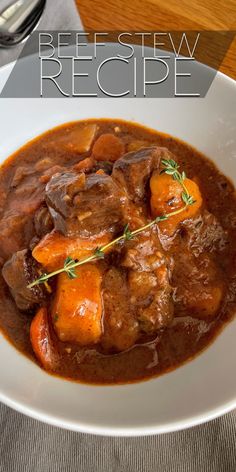 beef stew with carrots and gravy in a white bowl