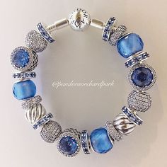 Loving the Okanagan blue skies and warm summer days ☀️ #uniqueasweare #pandora #pandorajewelry #pandoracharms #charms #bracelet #blue #jewelry #like4like #follow4follow Bohemian Blue Charm Bracelet As Gift, Pandora Bracelet Aesthetic Blue, Bohemian Blue Charm Bracelet Gift, Dark Blue Pandora Bracelet, Pandora Bracelet Blue Theme, Pandora Winter, Bracelets Pandora