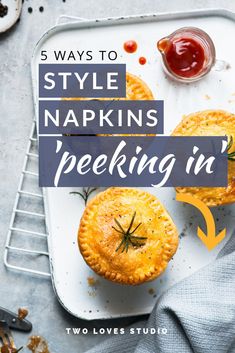 two small pies on a tray with the words 5 ways to style napkins'pecking