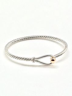 Free shipping in a box w free polish cloth. Solid sterling silver w rhodium gold ball that hooks. (available in all silver too) Ships out next business day. One of our more popular bracelets. Michaels located in Provincetown for over 15 years. Free size exchange if returned unworn. SIZE HINT: 6.5 for petite adult wrist, 7 is average size and so on. Handmade on Cape Cod. Gold Cape Cod Bracelet, Classic Silver Anchor Jewelry, Cape Cod Bracelet, Cape Cod Jewelry, Silver Nautical Anchor Jewelry, Nickel-free Anchor Shaped Sterling Silver Jewelry, Popular Bracelets, Silver Anchor-shaped Nautical Jewelry, Bf Gifts