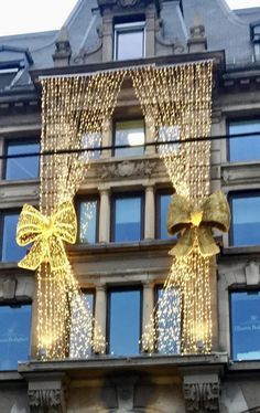 two large bows on the side of a building