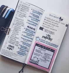 an open planner book with writing on it