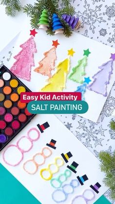 an easy kid activity salt painting with christmas trees and other holiday decorations in the background