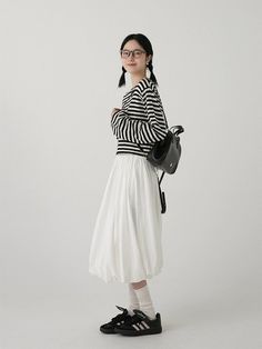 Discover effortless elegance with our High-Waisted Balloon Midi Skirt with Pockets, a timeless addition to any wardrobe. Crafted from 100% premium cotton, this skirt offers a comfortable and breathable fabric that's perfect for any season. The high-waisted A-line cut, complemented by a double-layered balloon hem, creates a sophisticated silhouette that enhances any figure. Practical side pockets add a touch of convenience, while the elastic waistband ensures a comfortable fit without compromisin Fall Cotton Pleated Skirt With Relaxed Fit, Casual Long Cotton Pleated Skirt, Fall Cotton Midi Pleated Skirt, White Cotton Maxi Skirt With Gathered Detail, Fall Cotton Pleated Midi Skirt, White Cotton Gathered Maxi Skirt, Casual Cotton Maxi Skirt For Daywear, Classic Cotton Pleated Skirt For Spring, White Cotton Relaxed Maxi Skirt