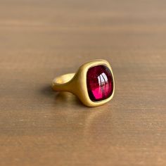 This juicy, saturated pink tourmaline makes a sumptuous statement within its resplendent golden setting. 18k yellow gold Tourmaline, 9.96ct, 11mm x 13mm (7/16" x 1/2") Ring face is approx. 9/16" x 5/8" Sweet Disposition, Newport Ri, Jewelry Lookbook, Ruby Ring, Dream Jewelry, Vintage Handbags, Pink Tourmaline, Signet Ring, Bracelet Gift