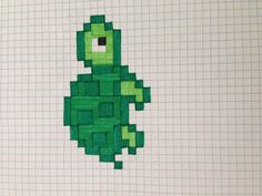 a piece of paper with an image of a cartoon character made out of green squares