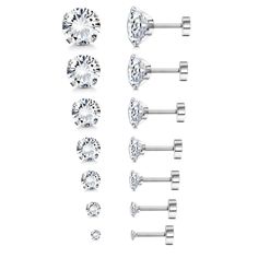 four pairs of diamond studs with different shapes and sizes, all in white gold