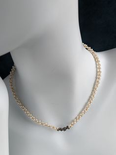 Champagne and Caviar - Black Diamond, Pearl, and 14 Karat Gold NecklaceA beautiful and elegant necklace! The combination of black diamonds and white pearls creates a striking contrast that adds sophistication to any outfit. The use of the Japanese Kumihimo technique to braid the beads on eight strands demonstrates the attention to detail and craftsmanship involved in creating this piece. With its 18" length, it's a versatile necklace that can be worn on various occasions. The incorporation of tr Elegant Double Strand Pearl Embellished Necklace, Elegant Black Pearl Necklace For Weddings, Elegant Black Bridal Necklace For Formal Occasions, Elegant Black Pearl Necklace, Black Pearl Chain Necklace For Wedding, White Akoya Pearl Necklace For Evening, Black Pearl Necklace For Wedding, Champagne And Caviar, Diamond And Pearl Necklace