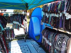 an outdoor market with various items for sale