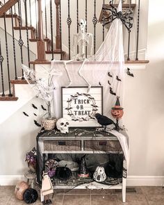 a halloween scene with bats and decorations on the stairs