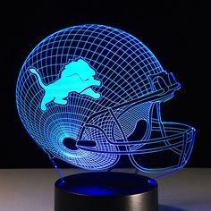 a light up football helmet with a cat on it