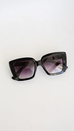 The Fierce Mood Black Square Sunglasses are here to stay and play all summer long! These essential summer sunglasses have an oversized square shape with black frames + gradient lenses! Save your eyes the strain and harmful rays with a pair of sunglasses that never compromise style or function. Oversized Square Shape Black Frames Gradient Lenses One Size | Frame Length 5.5" | Height 2" | Temple Arm Length 5.5" Black Square Sunglasses, Black Sunglasses Square, Black Frames, Summer Sunglasses, Exclusive Dress, Black Square, Women's Sunglasses, Square Shape, Square Sunglasses Women