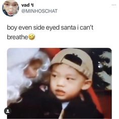 a young boy wearing a hat and jacket with the caption'boy even side - eyed santa i can't breathe '