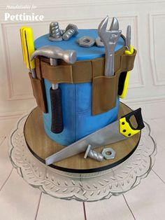 there is a cake that has tools on it