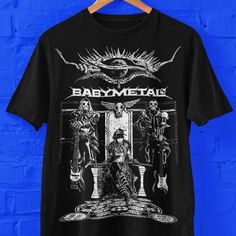 Babymetal graphic t-shirt for fans of J-Pop, K-Pop, heavy metal music. Great gift for J-Pop Metal Fans Bella+Canvas 3001 * 100% Airlume combed and ringspun cotton (fiber content may vary for different colors) * Light fabric (4.2 oz/yd² (142 g/m * Retail fit * Tear away label * Runs true to size With side seams Located along the sides, they help hold the garment's shape longer and give it structural support Shoulder tape Twill tape covers the shoulder seams to stabilize the back of the garment an Rock Style T-shirt With Band Logo For Music Festivals, Metal Band Merch, Halloween Rocker T-shirt For Concerts, Rock Style Band Logo T-shirt For Streetwear, Alternative Style Fan Merchandise T-shirt With Front Print, Alternative Band Logo T-shirt For Music Festivals, Alternative Style Band Logo T-shirt For Music Festivals, Band Merch T-shirt With Graphic Design, Music-themed T-shirt With Band Logo For Streetwear