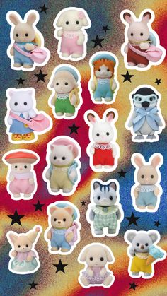 a bunch of small animal stickers sitting on top of a colorful background with stars