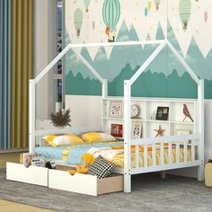 a child's bed with a white frame and canopy