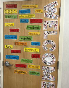 a door decorated with colorful stickers and writing