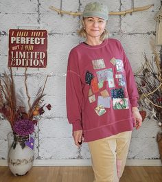 "Oversized with dropped shoulder style, Large Old Navy, lightweight sweatshirt in maroon red color, embellished with cotton patchwork in the front. Each patch was sewn on using a different decorative machine stitch with green thread for contrast.  Split open on both sides.  More fraying may occur with each wash, simply cut the excess to your liking. Machine washed and tumbled dry before and after making.  Women's size - Oversized Large to X-Large Approximate measurements: All taken when laying f Cotton Sweatshirt With Patchwork In Relaxed Fit, Long Sleeve Sweatshirt With Patches For Fall, Casual Fall Sweatshirt With Patches, Red Patchwork Sweatshirt For Fall, Casual Oversized Patchwork Sweatshirt, Oversized Patchwork Cotton Sweatshirt, Oversized Cotton Patchwork Sweater, Oversized Long Sleeve Patchwork Sweatshirt, Oversized Red Cotton Sweater