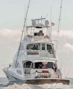 a large white boat in the middle of the ocean