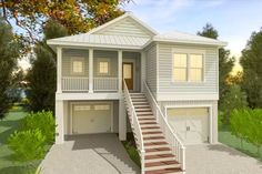 a two story house with stairs leading up to the second floor