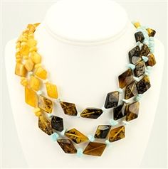 Luxury Faceted Amber Jewelry, Luxury Amber Jewelry With Natural Stones, Yellow Multi-strand Polished Beads Jewelry, Artisan Amber Necklace Single Strand, Artisan Amber Single Strand Necklace, Yellow Multi-strand Jewelry With Polished Beads, Unique Double Strand Gemstone Jewelry, Unique Yellow Gemstone Necklace, Luxury Handmade Amber Necklace