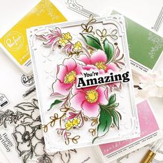 a card with flowers on it and some other cards around it that say you're amazing