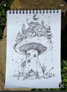 a drawing of a mushroom house on top of a rock